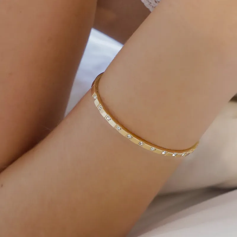 Halo Click Bangle sold by Evry Jewels