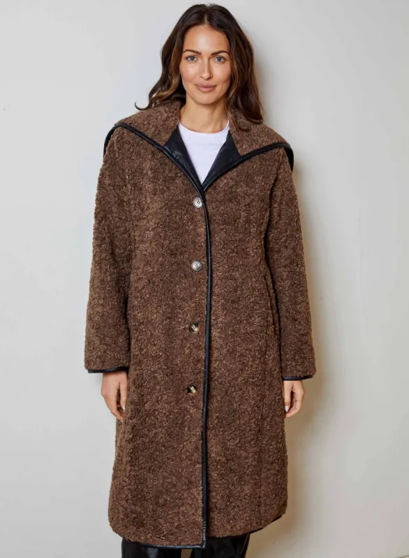 Trace Coat sold by DH New York