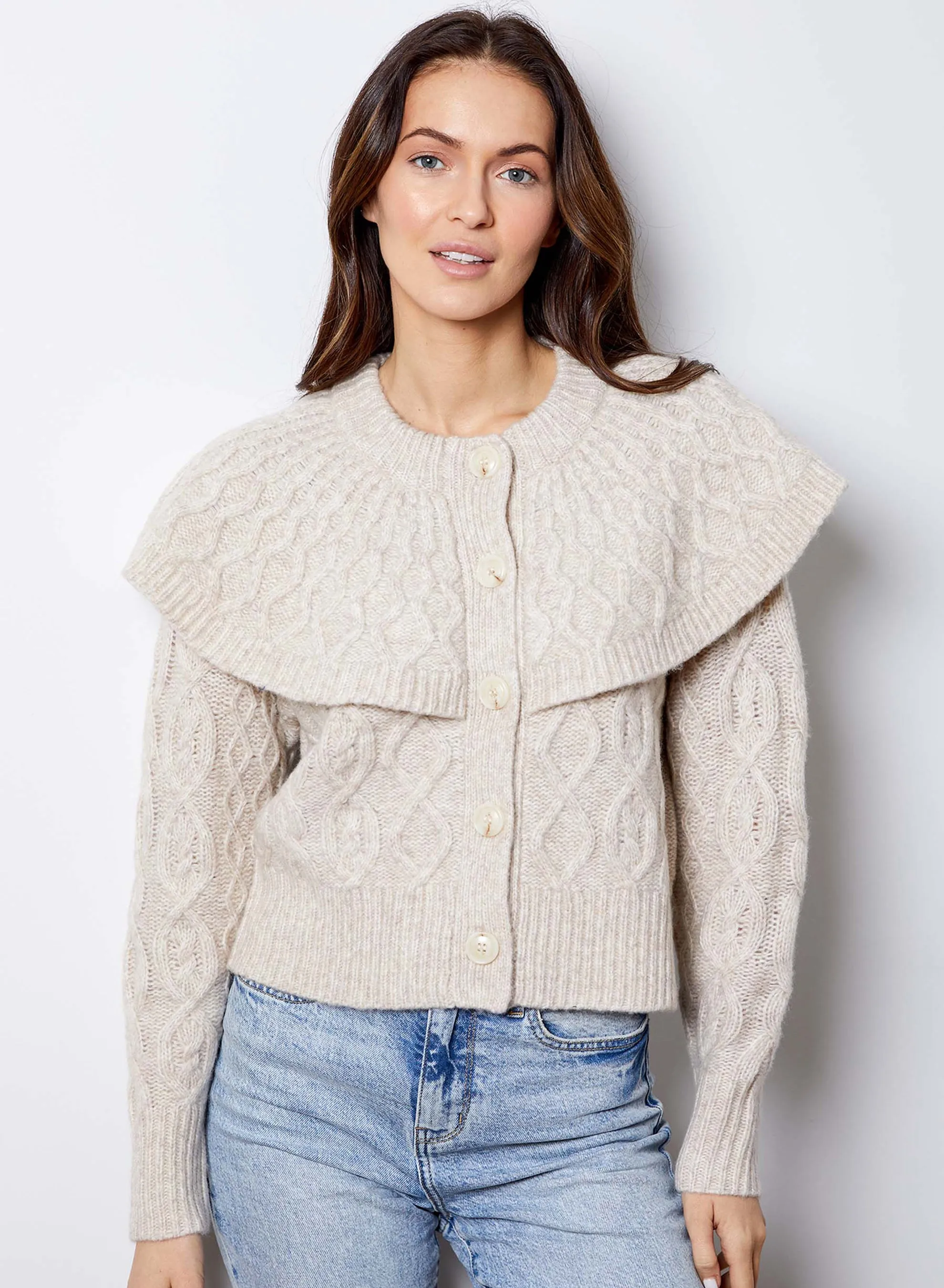 Domino Cardigan sold by DH New York