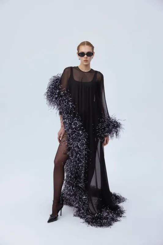 Maxi feather dress sold by Santa Brand