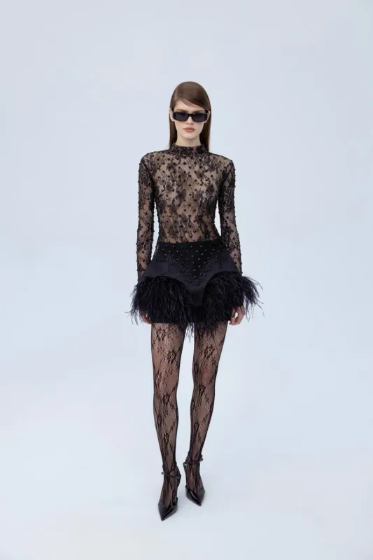 Diamante turtleneck sold by Santa Brand