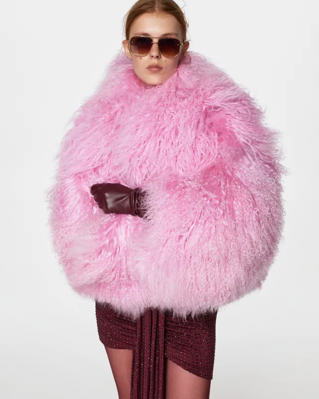 Short fur coat with hood sold by Santa Brand