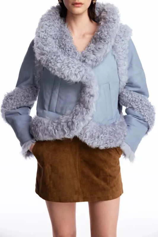 Suede mini skirt with silhouette lines sold by Santa Brand