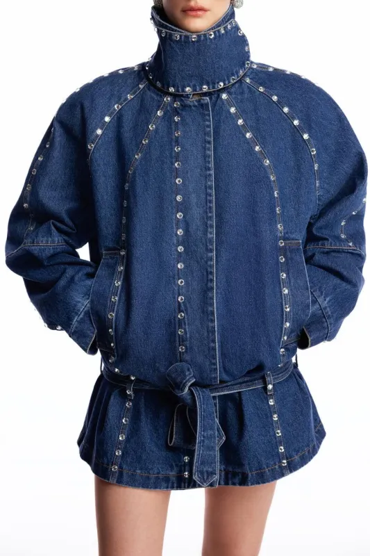 Denim oversized jacket with
silhouette lines and crystals sold by Santa Brand