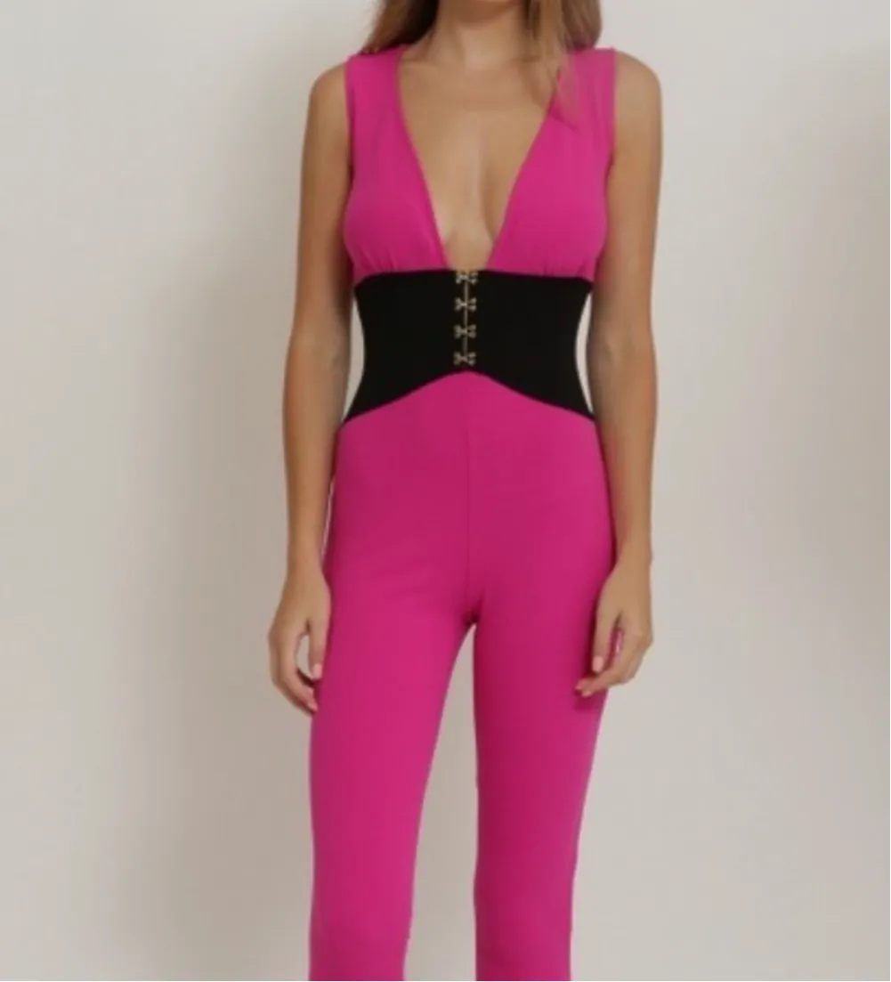 Women’s Hot Pink Stretchy Jumpsuit sold by Unleashed Streetwear