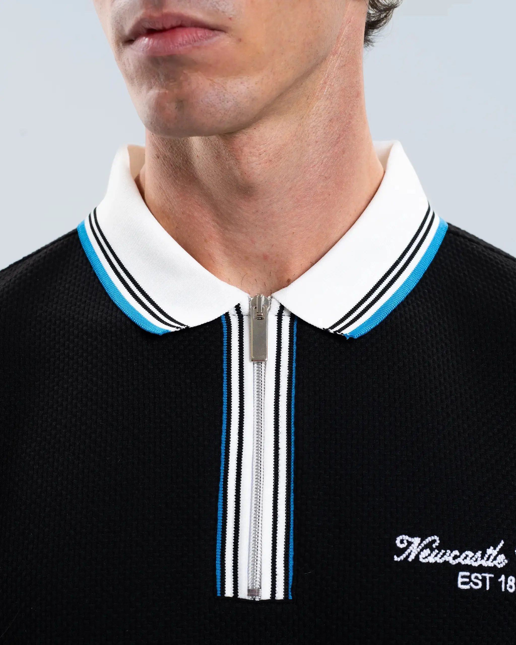 Newcastle United Men's Zipped Black Polo Shirt sold by Newcastle United product image thumbnail 2