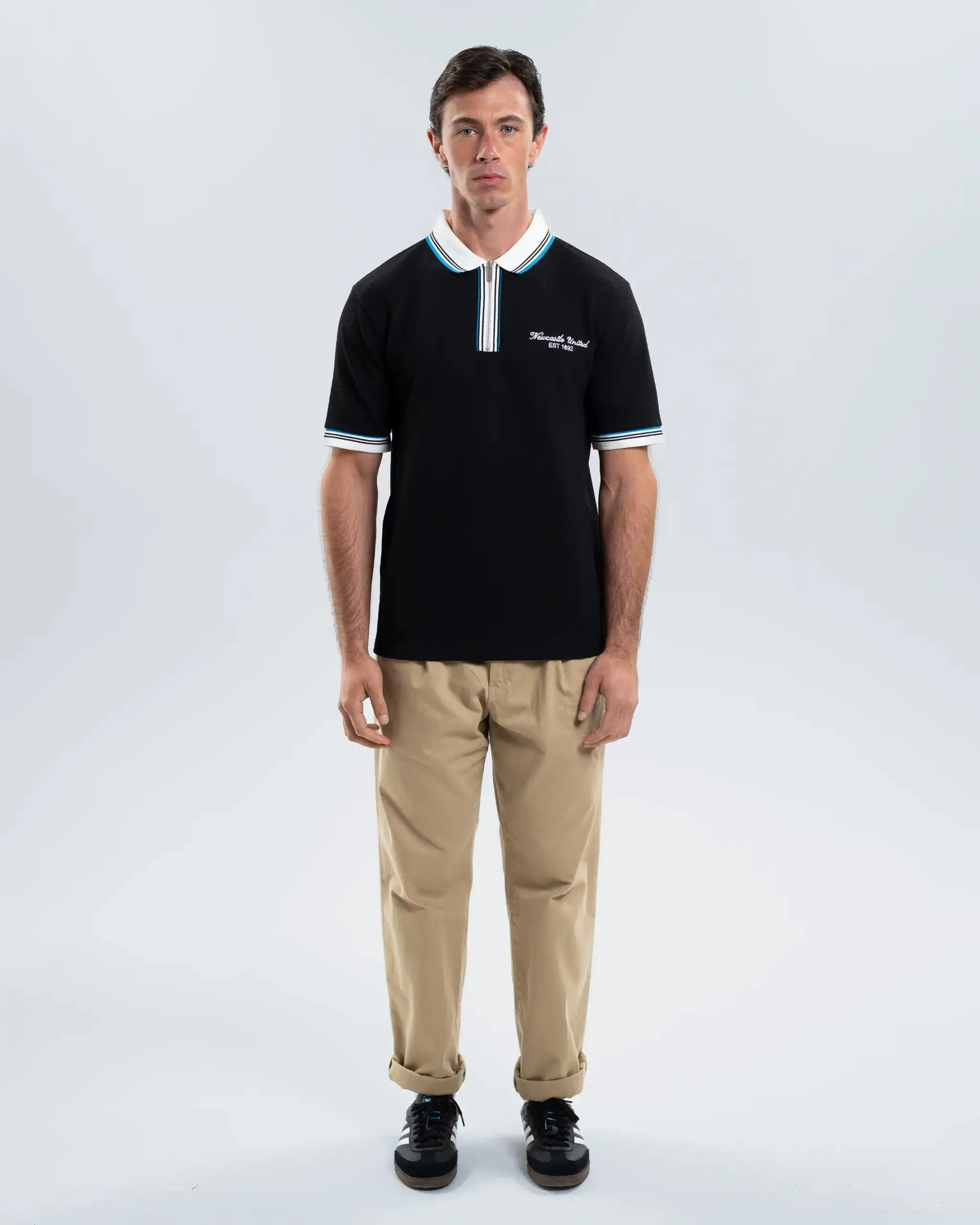 Newcastle United Men's Zipped Black Polo Shirt sold by Newcastle United