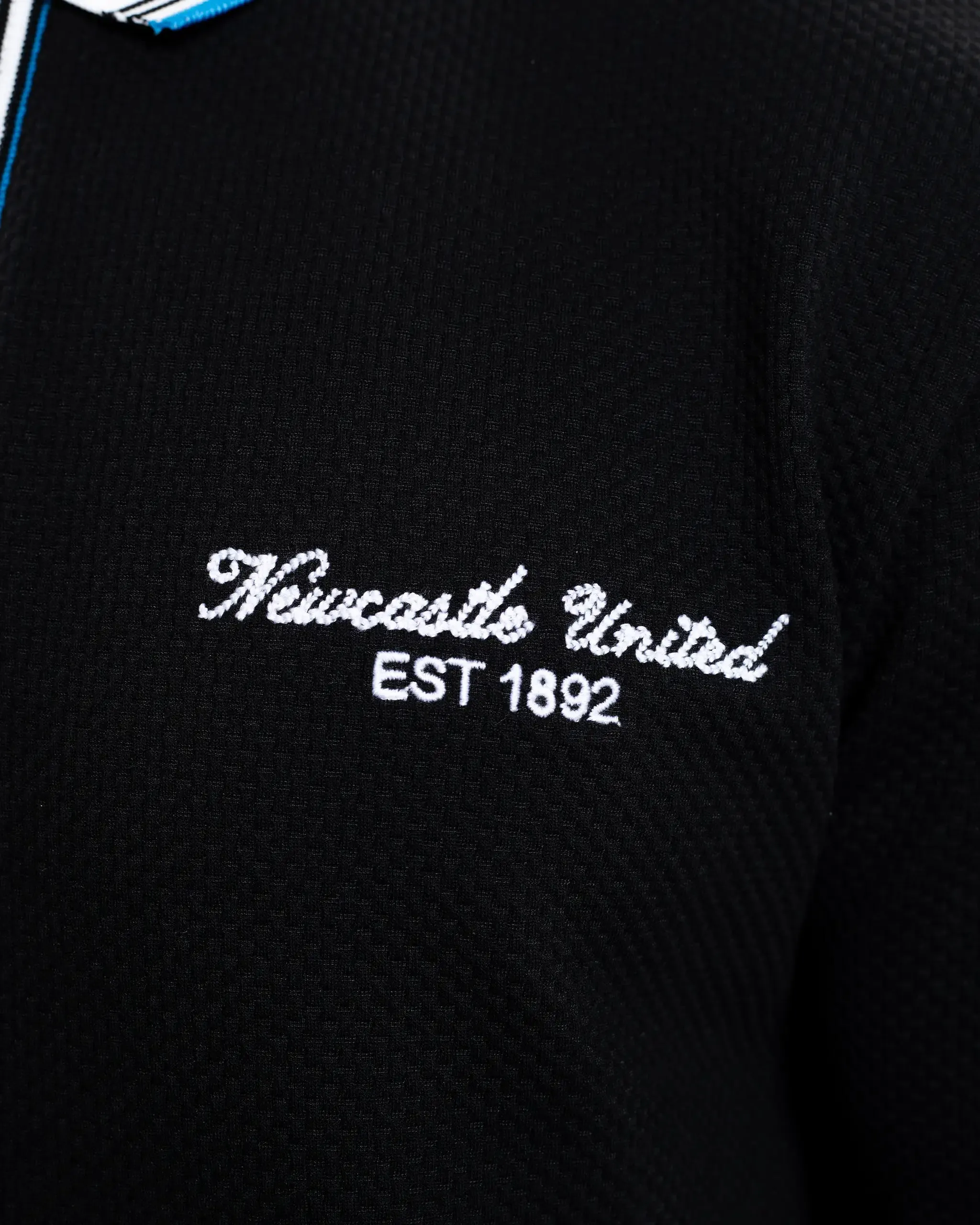 Newcastle United Men's Zipped Black Polo Shirt sold by Newcastle United product image thumbnail 3