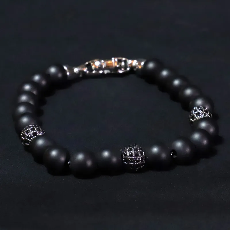 Pulsera Andro  · Pulsera de acero inoxidable y cobre con cuentas sold by Barlovento de Biar