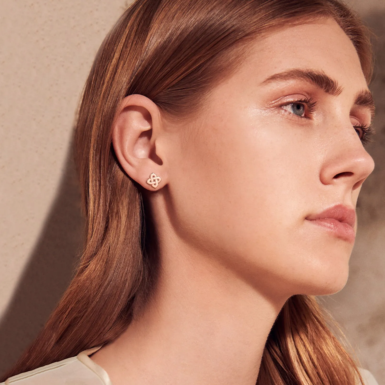 Celtic Knot Stud Earrings for Women in Sterling Silver sold by FaithHeart product image thumbnail 3