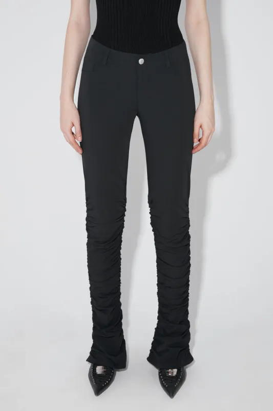 Lara Stacked Elastic Trousers sold by MISBHV