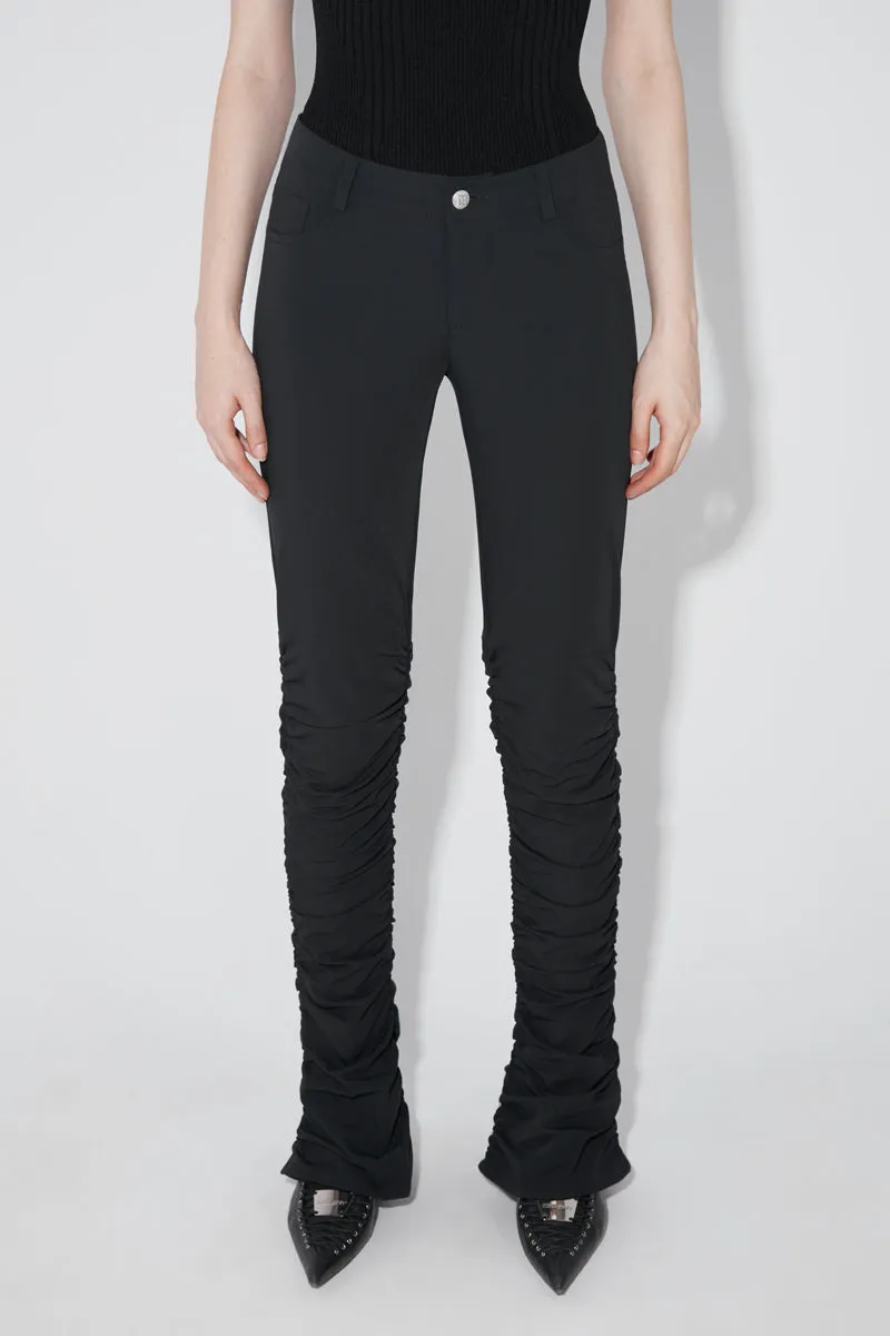 Lara Stacked Elastic Trousers sold by MISBHV