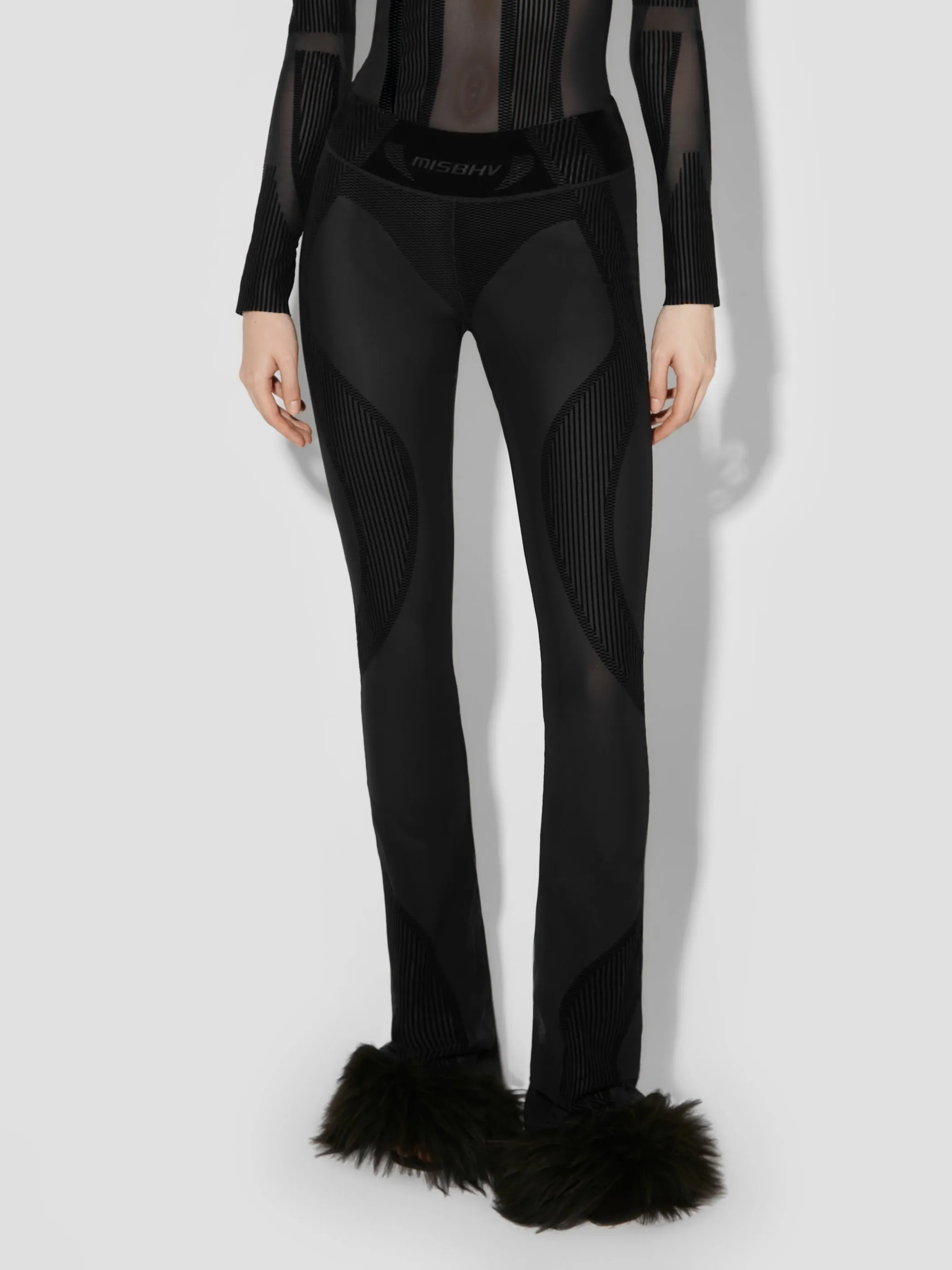 Flock Mesh Sport Flared Pants sold by MISBHV