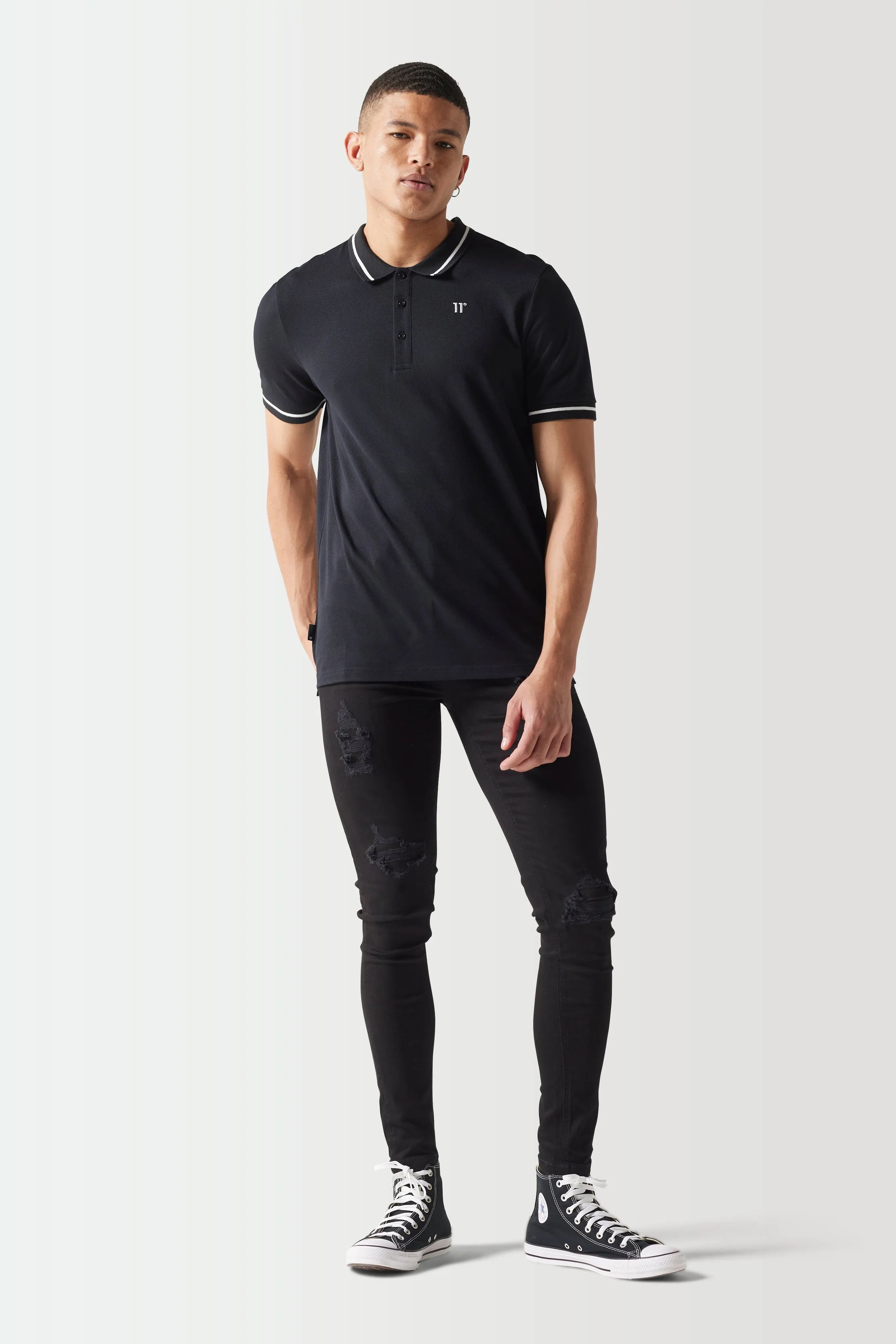 CORE Camiseta Polo - Negra sold by Eleven degrees
