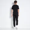 Joggers De Corte y Confección Con Panel De Texto Niño - Negro sold by Eleven degrees