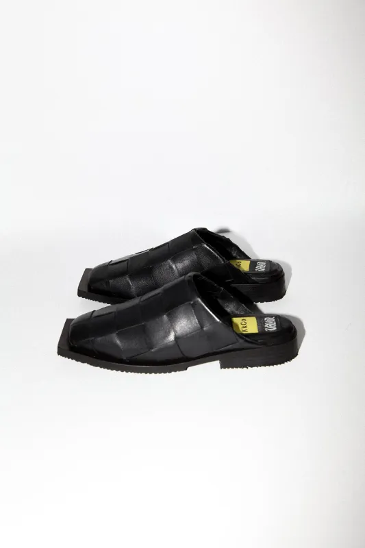 The Mule in Black sold by KkCo