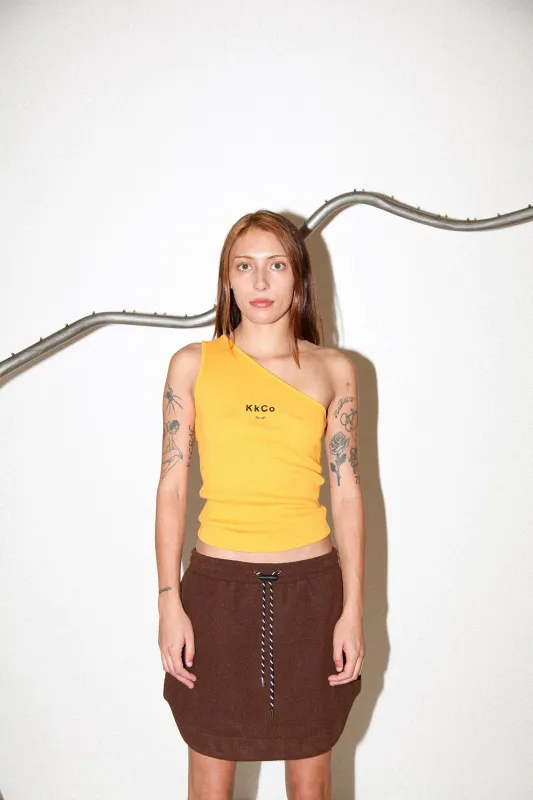 Pierced One Shoulder Rib Tank in Marigold made by KkCo