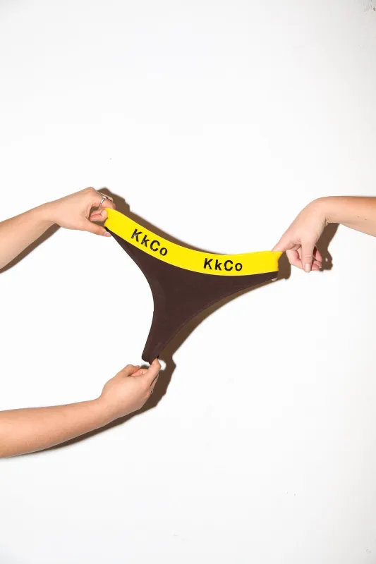 Dag Thong in Chocolate & Black sold by KkCo