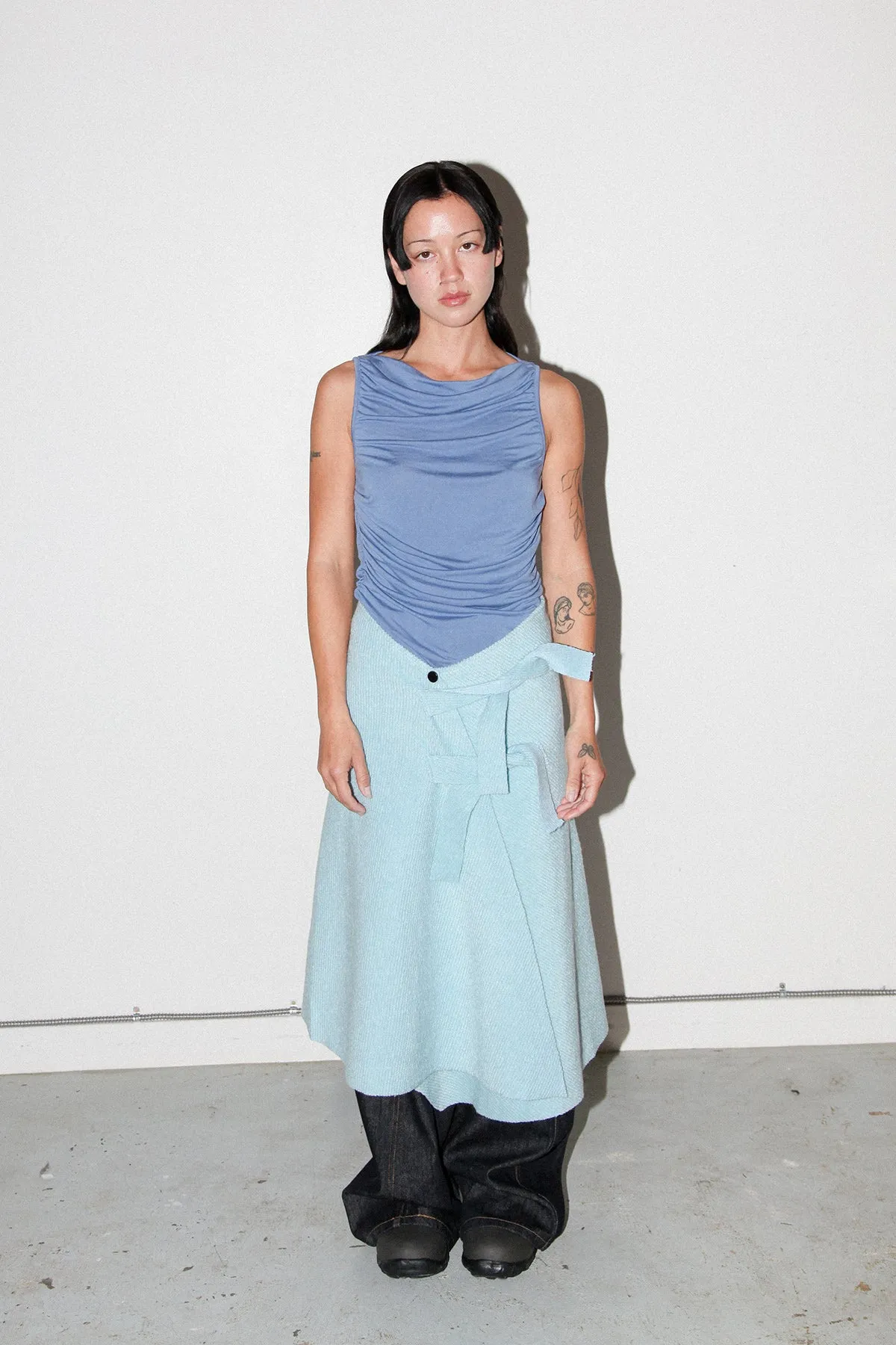 Slope Wrap Skirt in Sky sold by KkCo