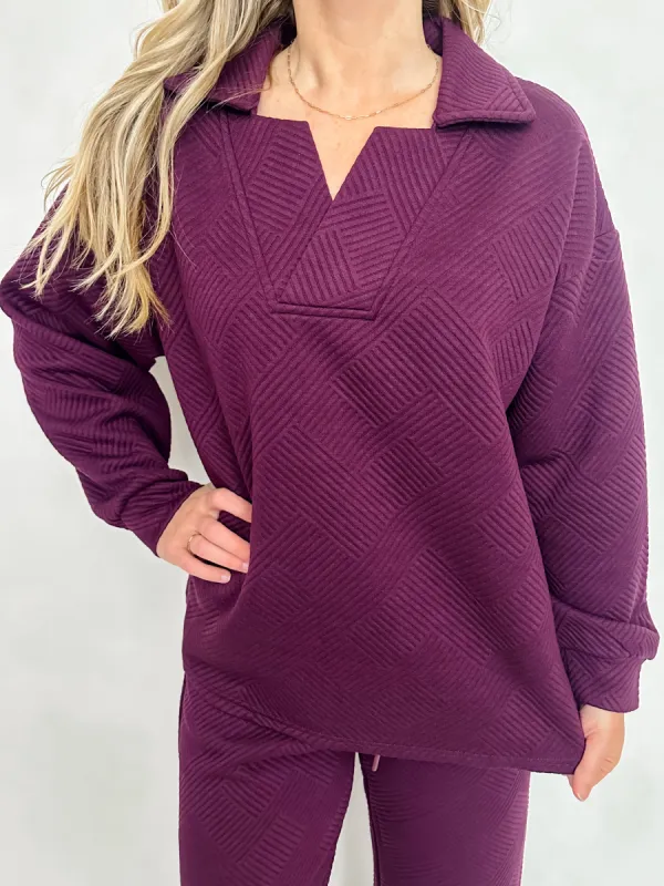 What's the Angle Collared Sweatshirt sold by Mimosa