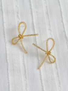 Gemelli Pearl Bow Studs sold by Mimosa