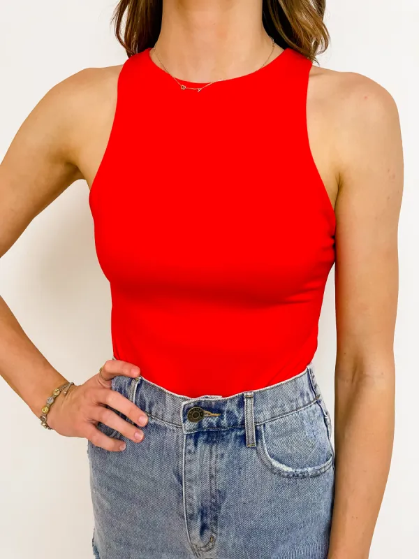 Solid Stretch Bodysuit sold by Mimosa