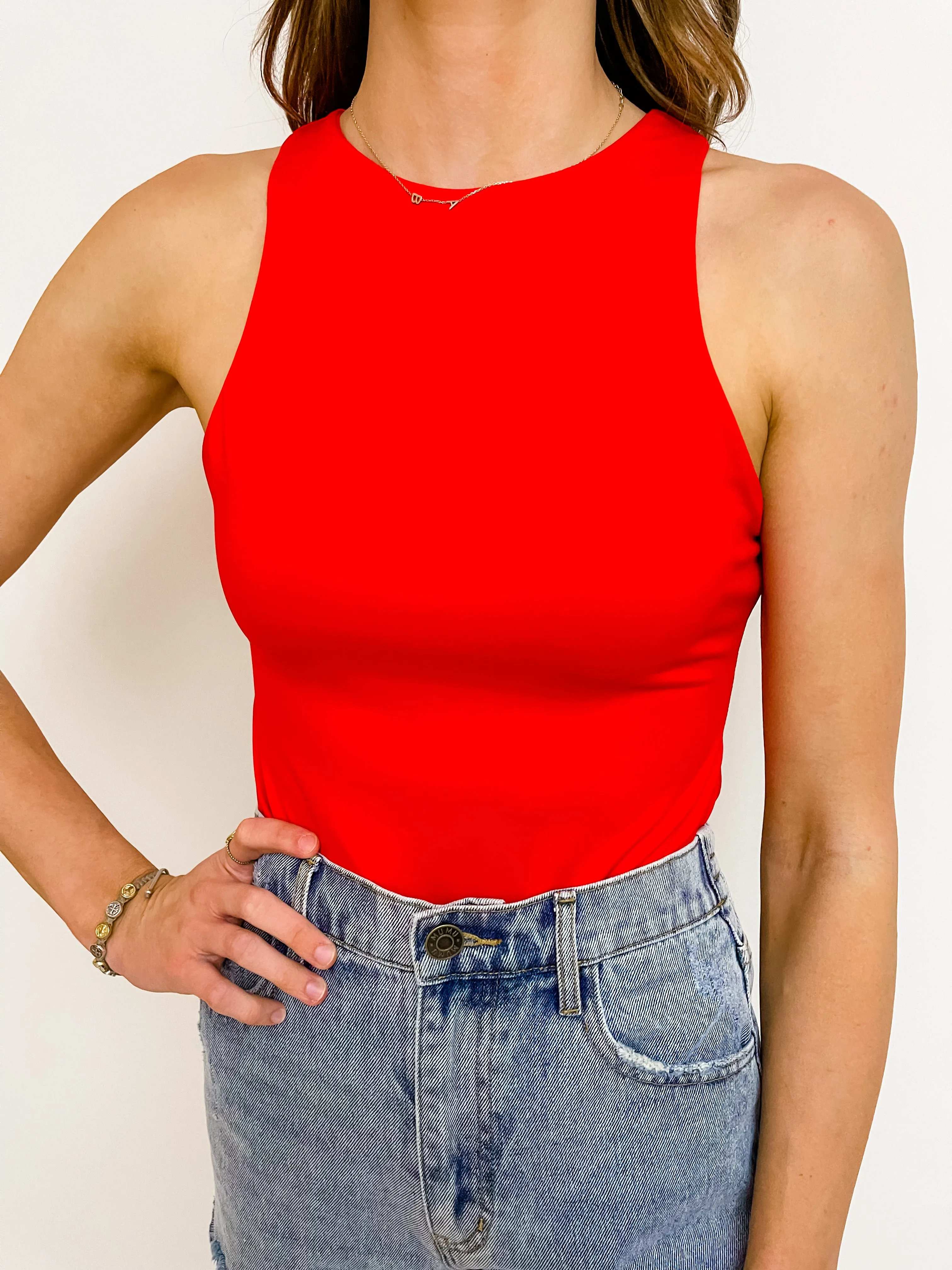 Solid Stretch Bodysuit sold by Mimosa