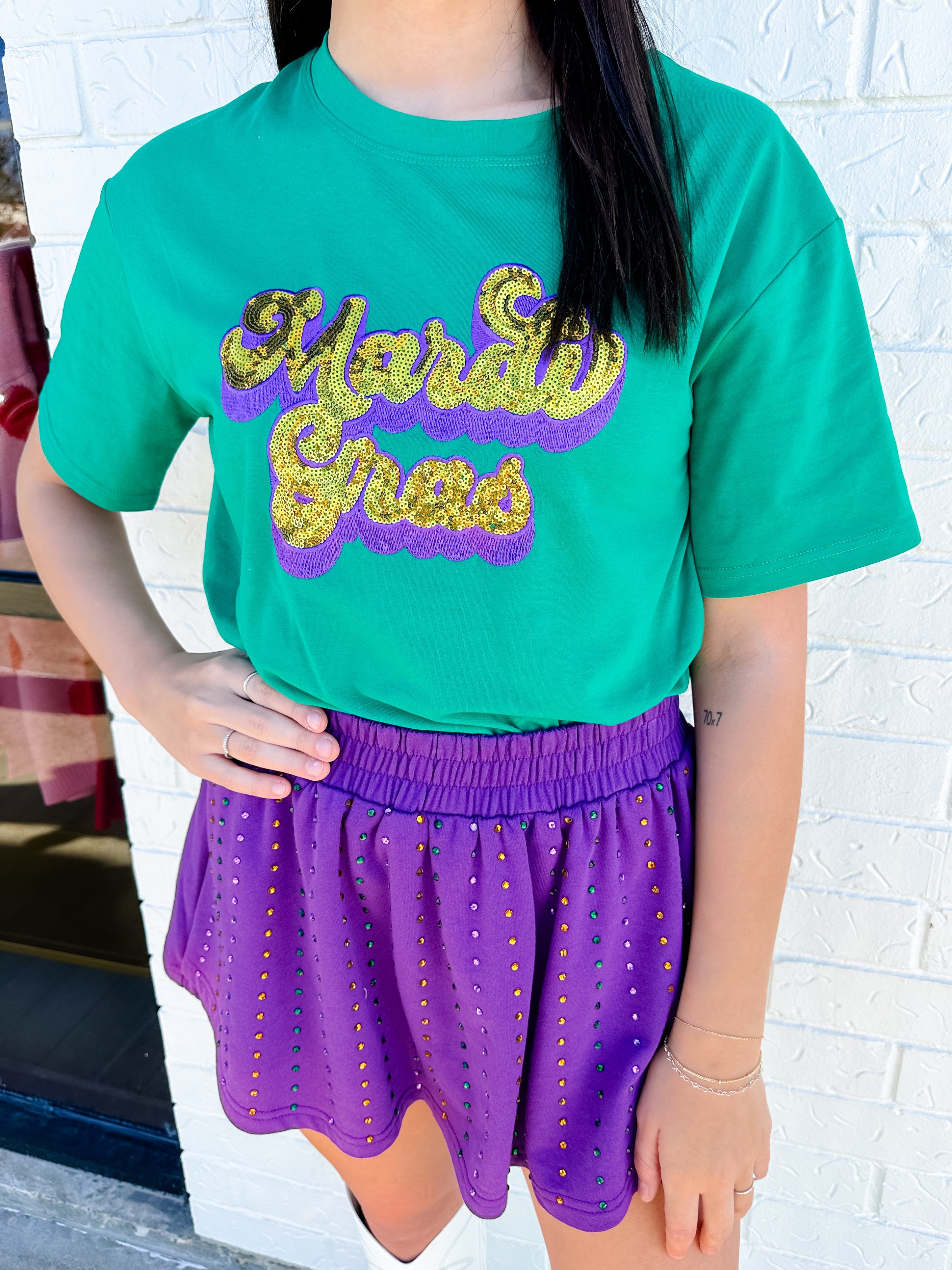 Mardi Gras Script Graphic Tee sold by Mimosa