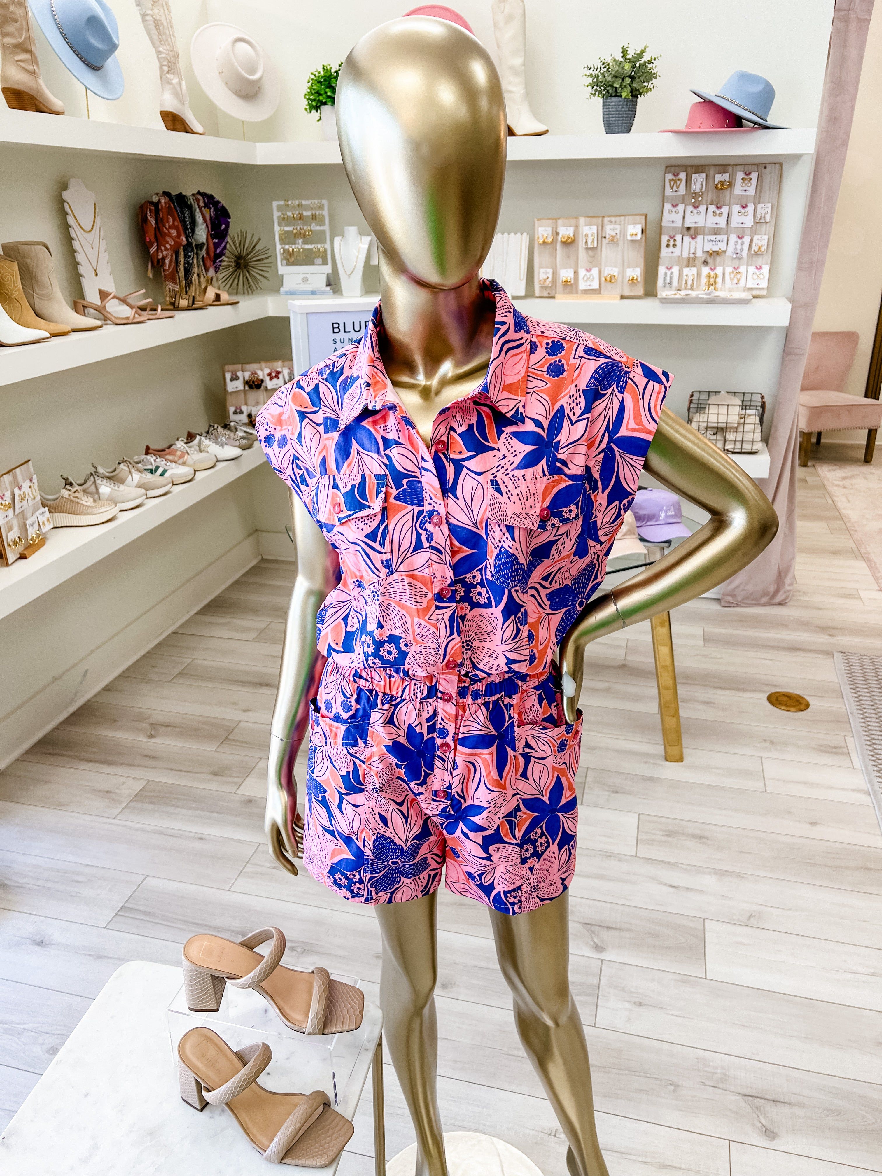 Floral Poplin Utility Romper sold by Mimosa