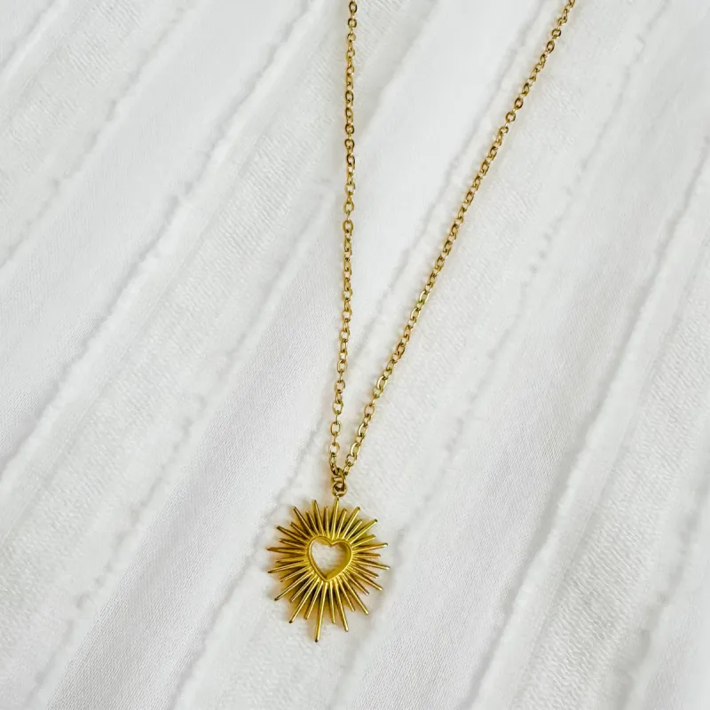 Flaming Heart Necklace sold by Mimosa
