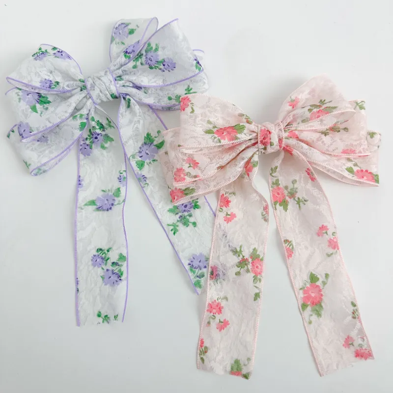 Floral Bow sold by Mimosa