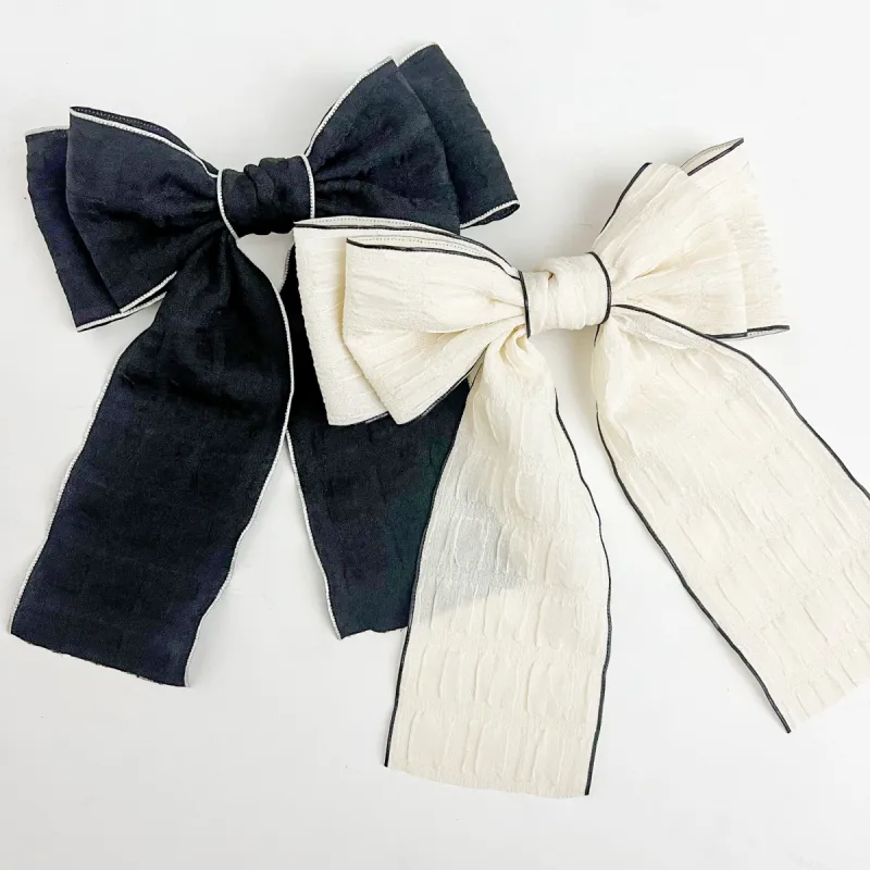 Kyra Bow sold by Mimosa