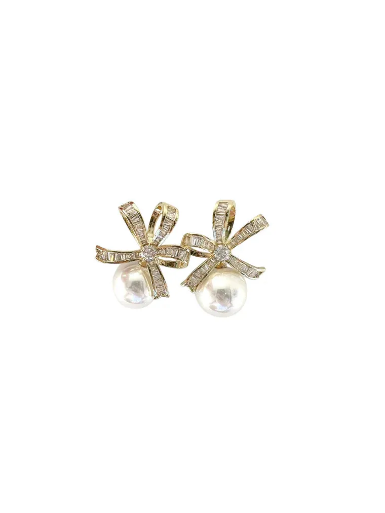 Gemelli Pearl Ribbon Earring sold by Mimosa
