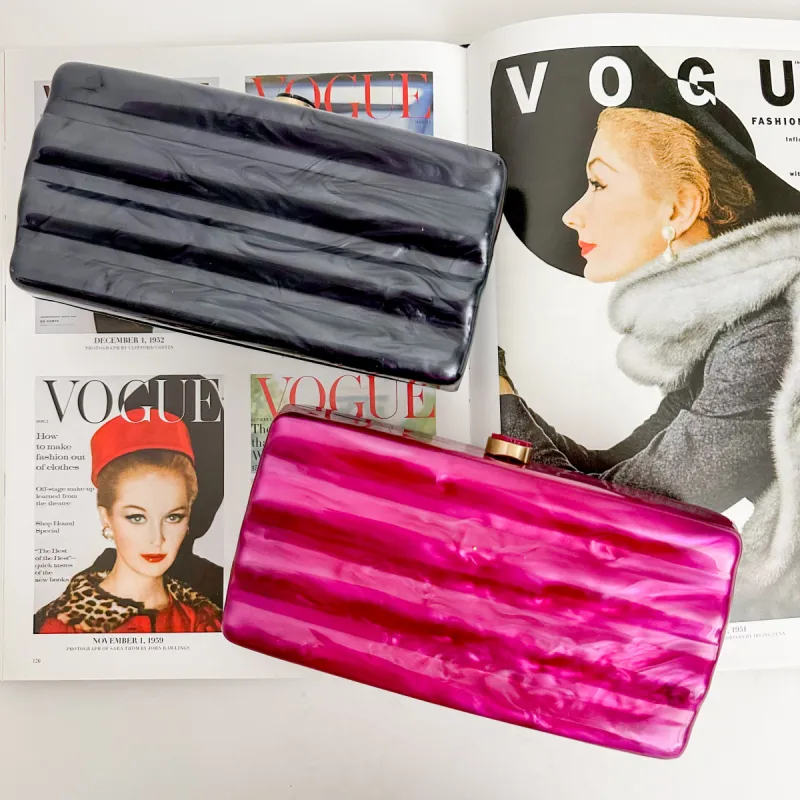 Carmen Pearlized Clutch sold by Mimosa