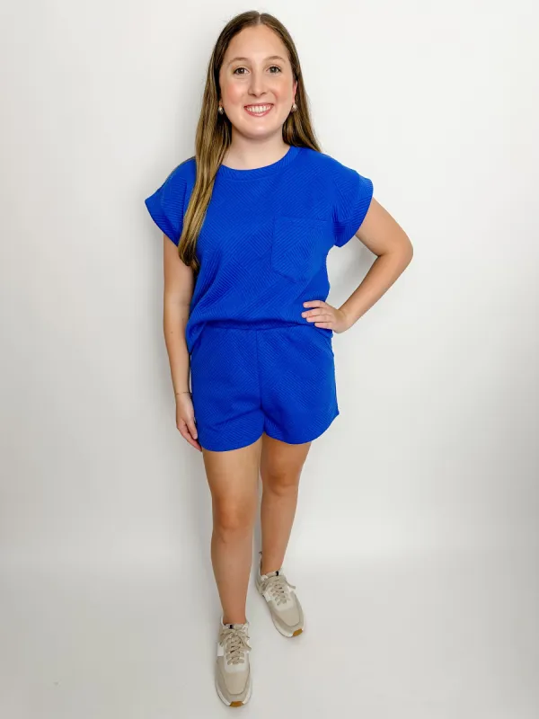 On The Go Textured Pocket Top sold by Mimosa