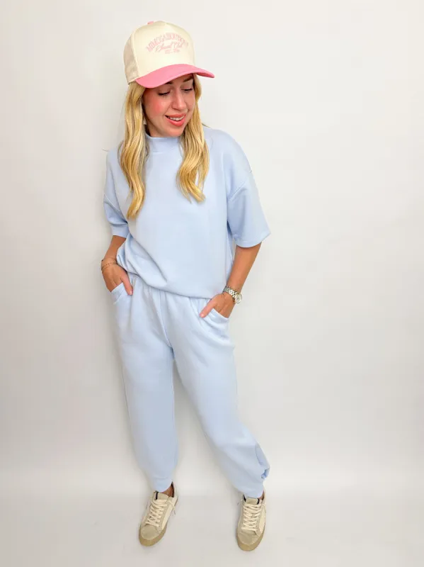 In Motion Mock Neck Scuba Top sold by Mimosa