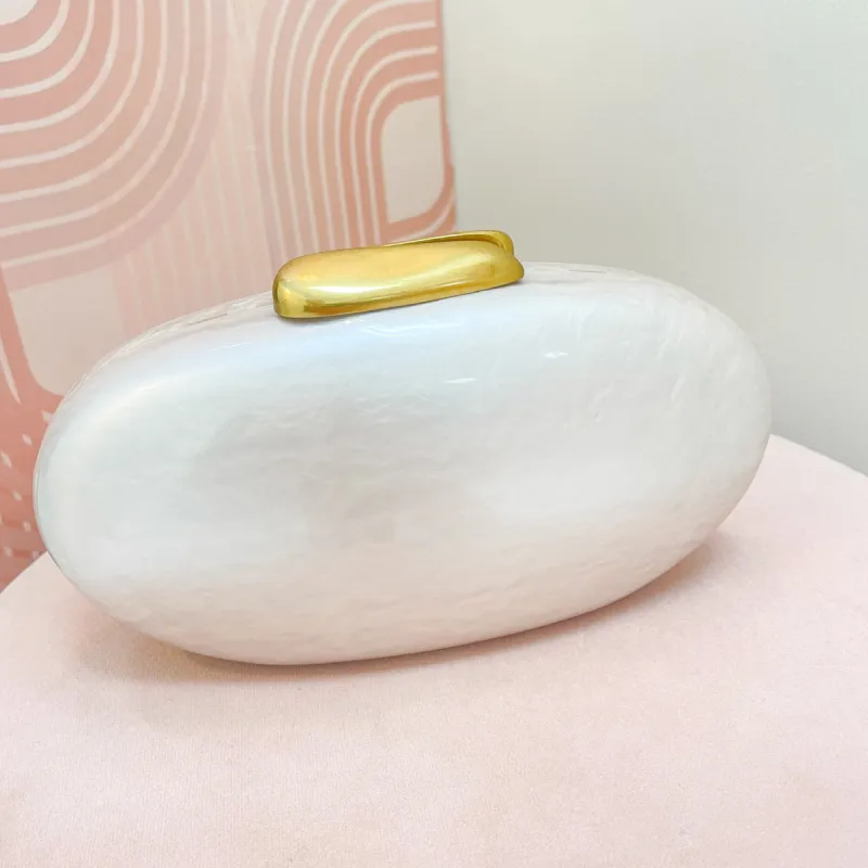 Pearlized Oval Acrylic Clutch sold by Mimosa