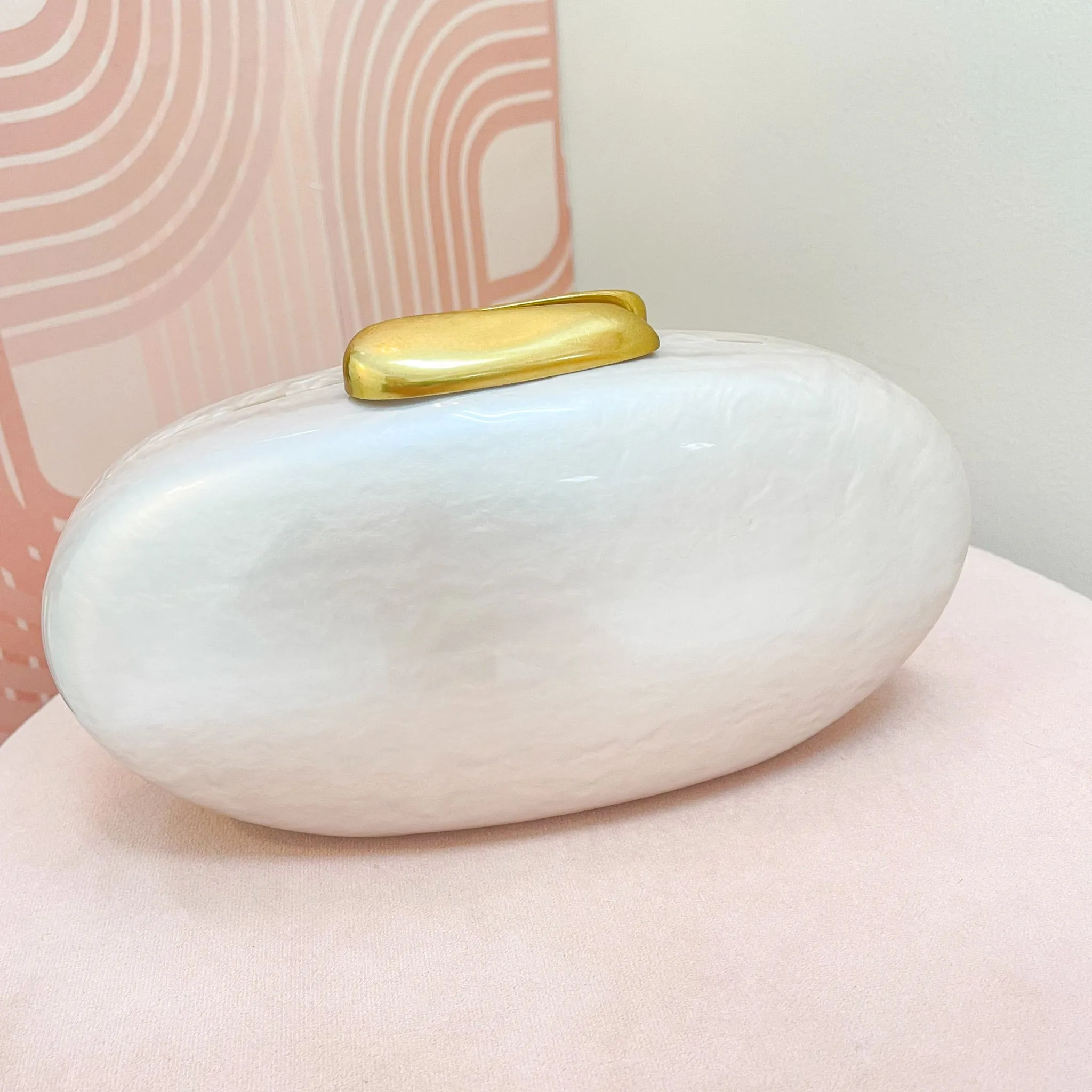 Pearlized Oval Acrylic Clutch sold by Mimosa