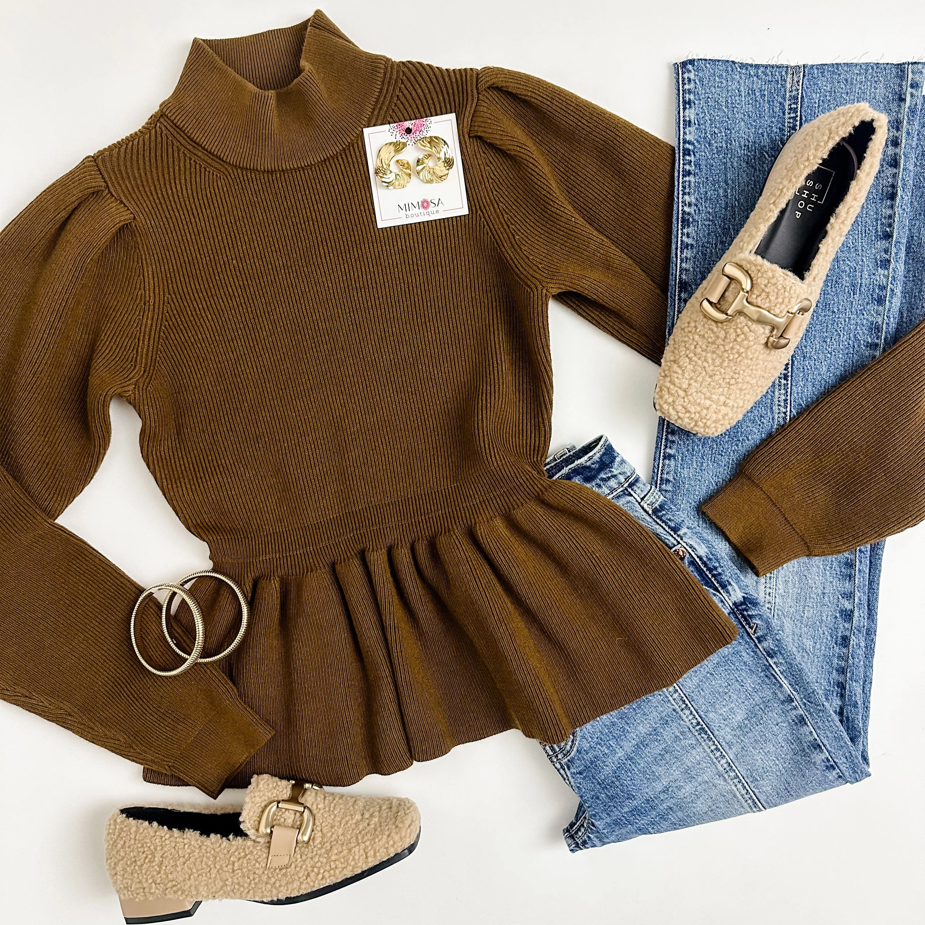 Selene Peplum Sweater Top sold by Mimosa