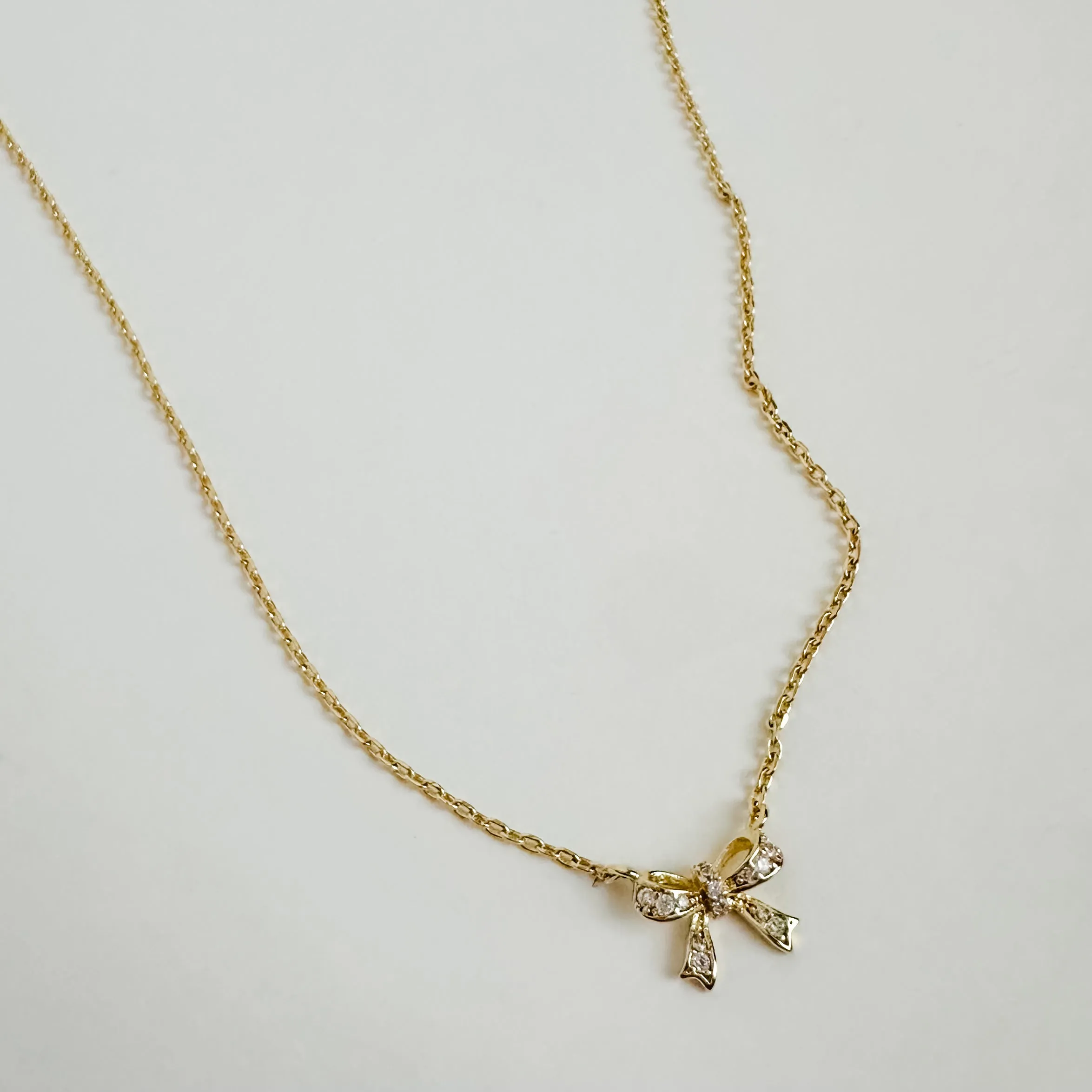 Luxe Tiny Pave Bow Necklace sold by Mimosa product image thumbnail 2