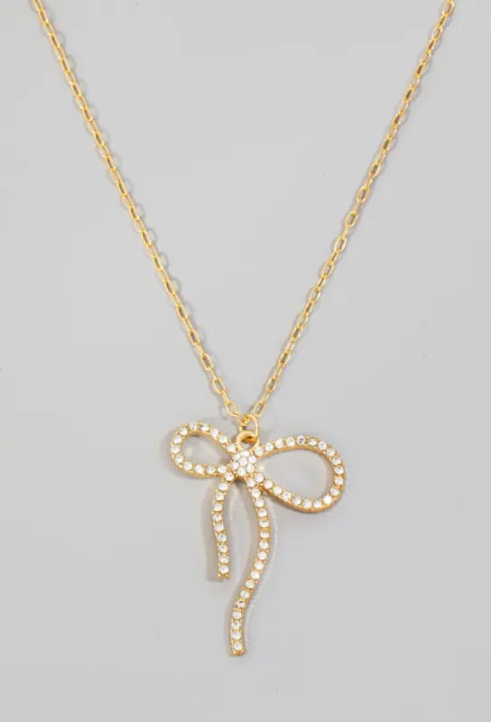 Crystal Ribbon Bow Pendant Necklace sold by Mimosa