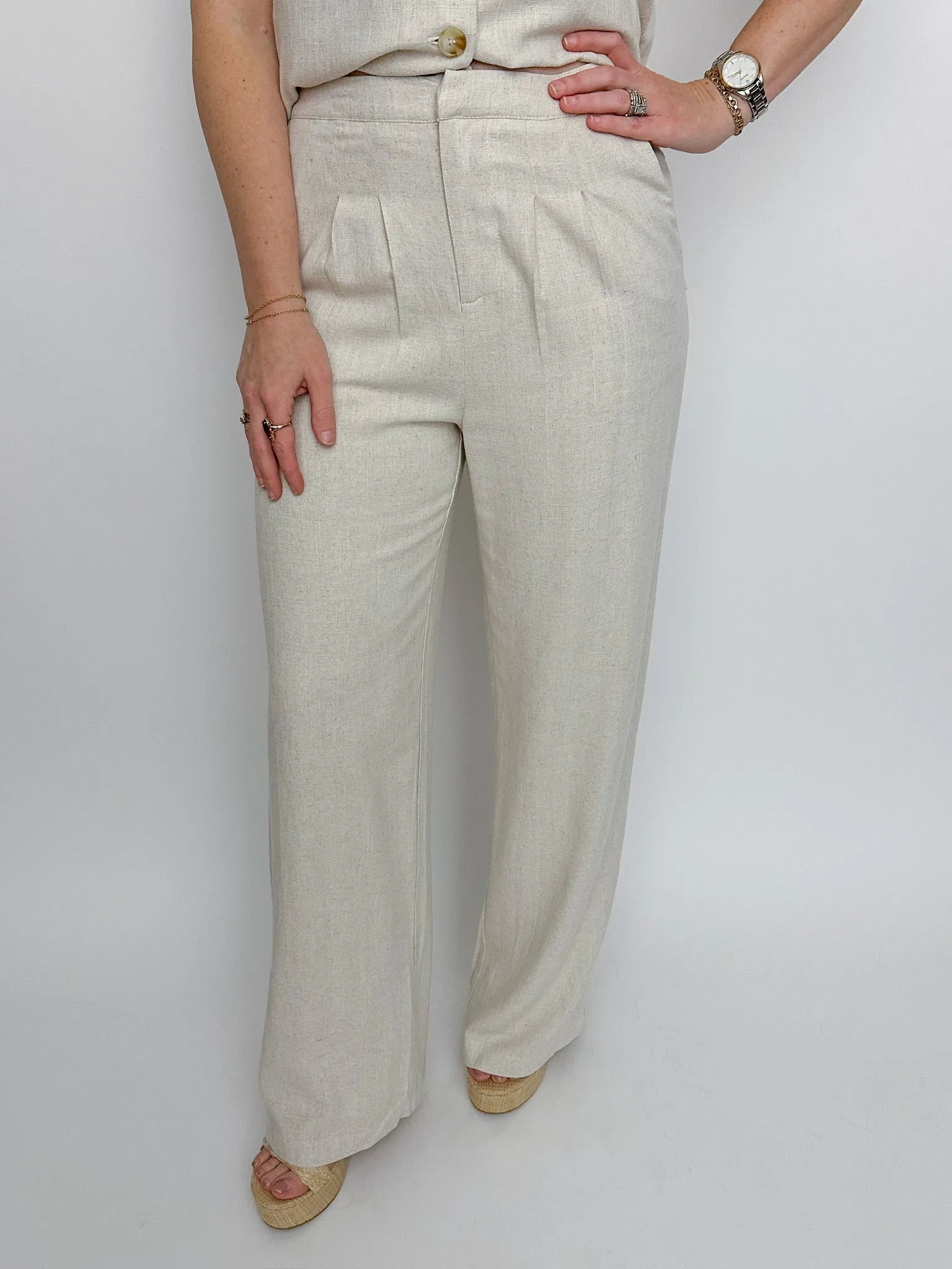 La Luna Linen Pleated Trousers sold by Mimosa