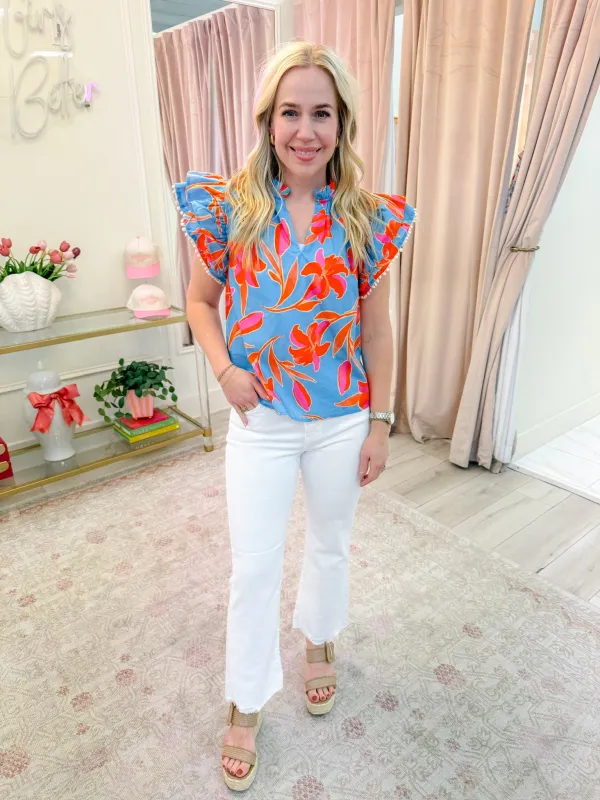 Mandarin Floral Flutter Sleeve Top sold by Mimosa