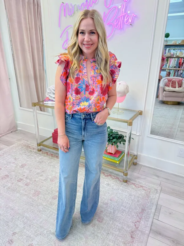 Sutton Floral Ruffle Sleeve Blouse sold by Mimosa