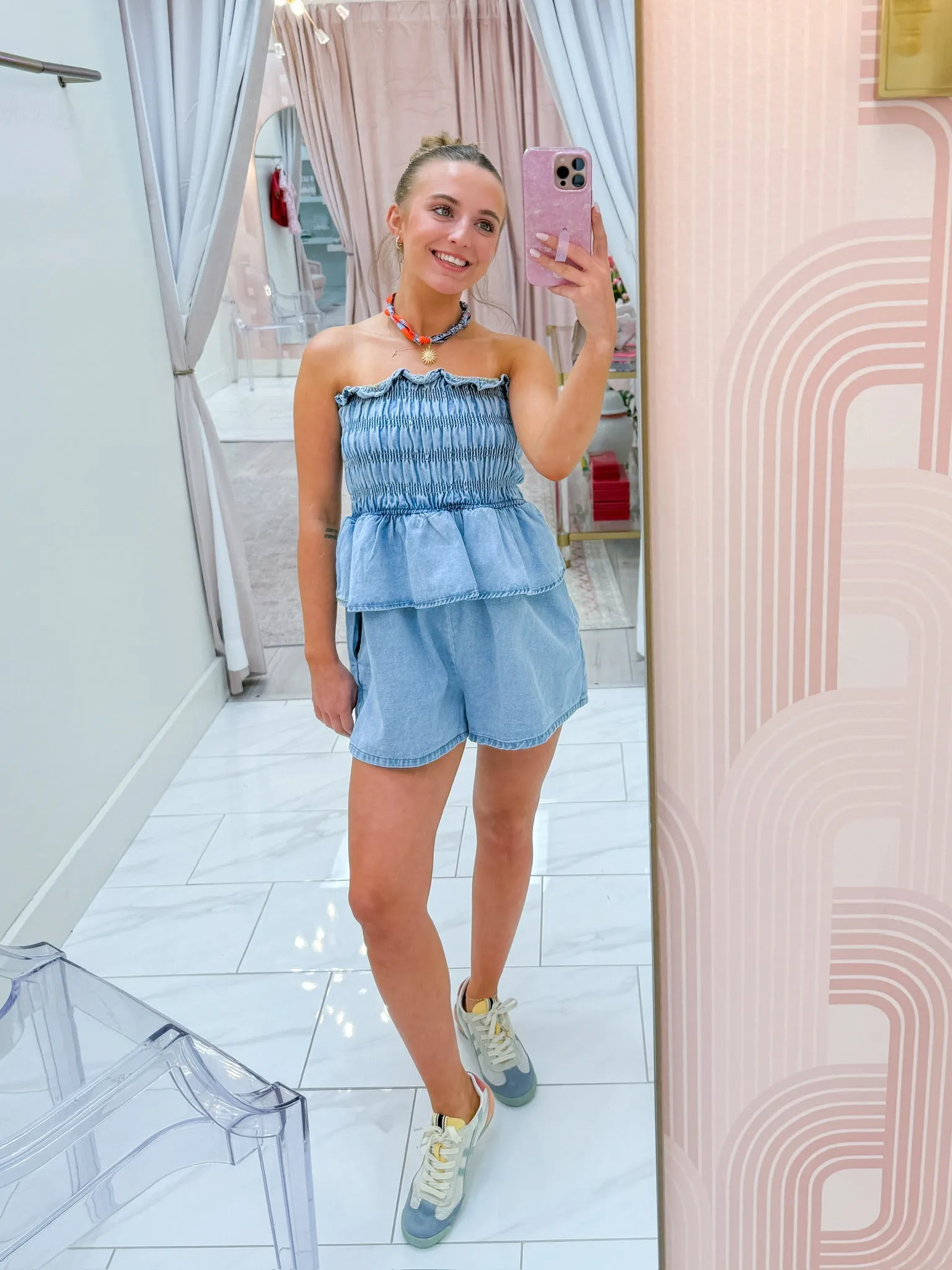 Riley Denim Ruffle Romper sold by Mimosa