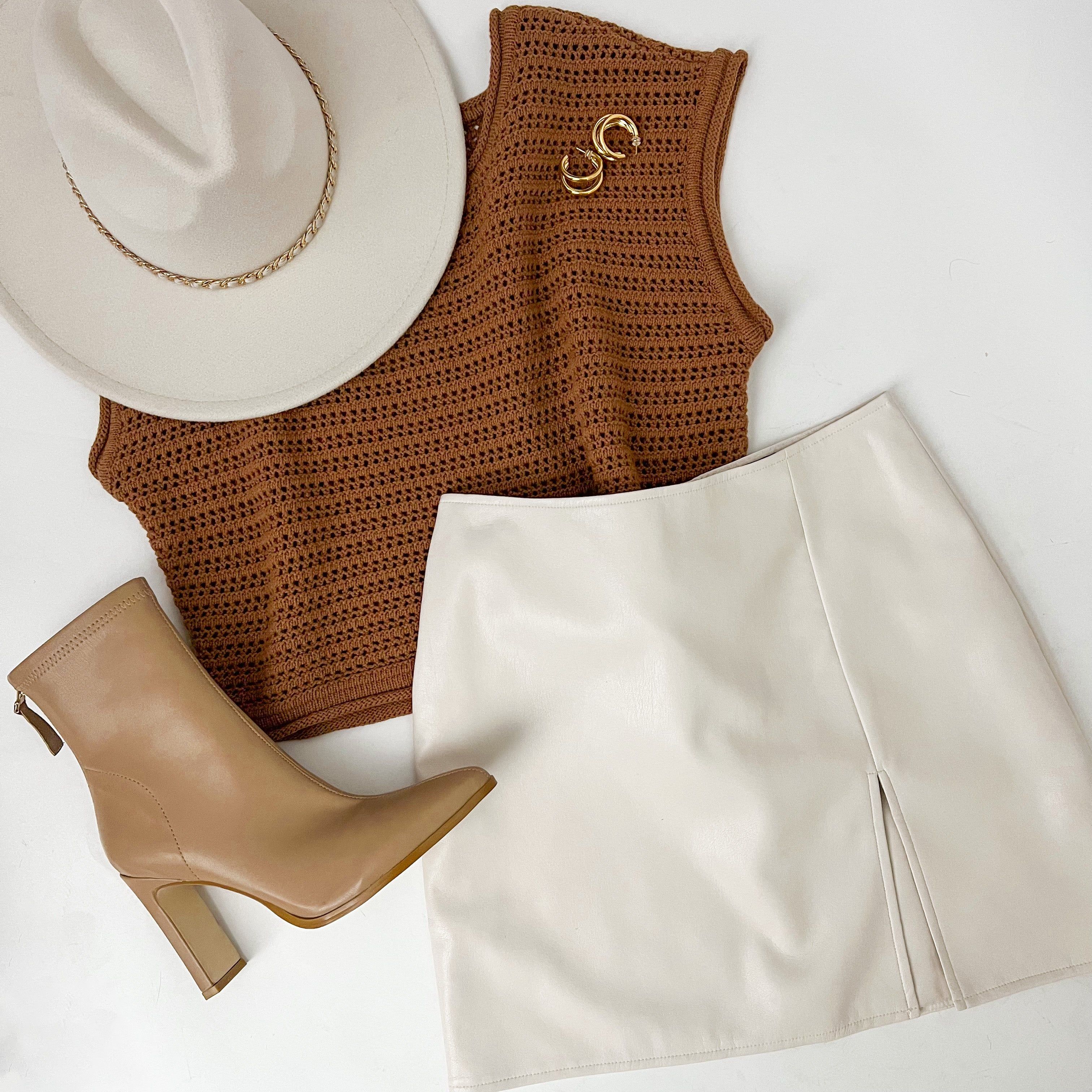 City Slicker Faux Leather Mini Skirt sold by Mimosa