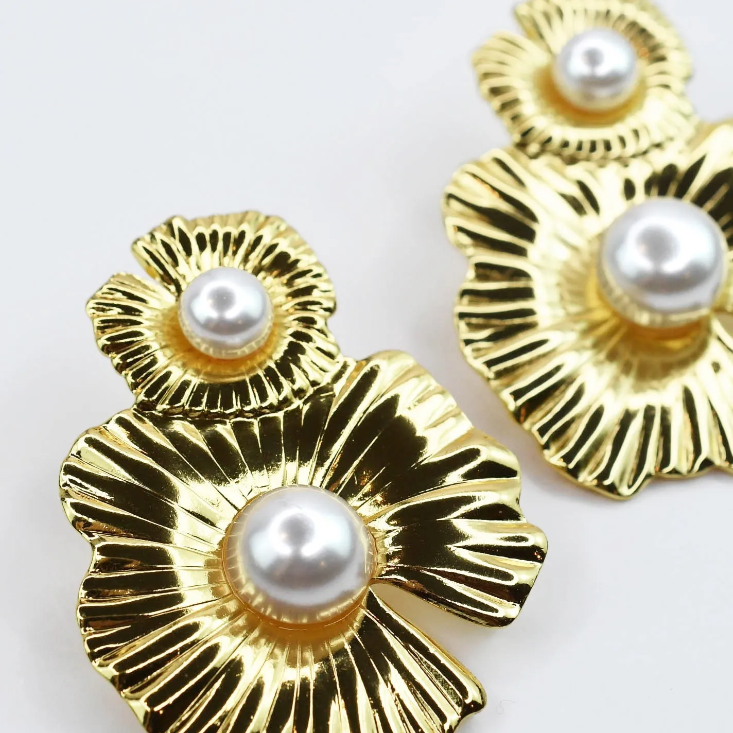 Golden Pearl Bloom Earrings sold by Mimosa