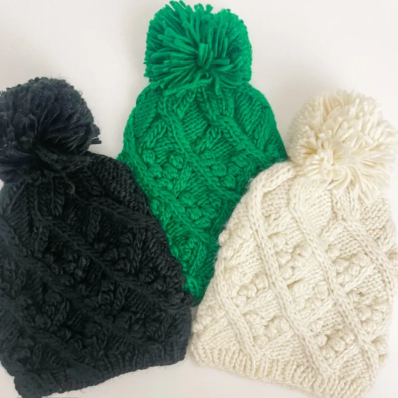 Cable Knit Pom Beanie sold by Mimosa