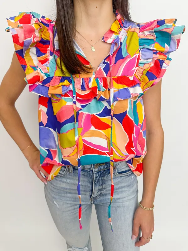 Ruffle Bib Top Geo Floral sold by Mimosa