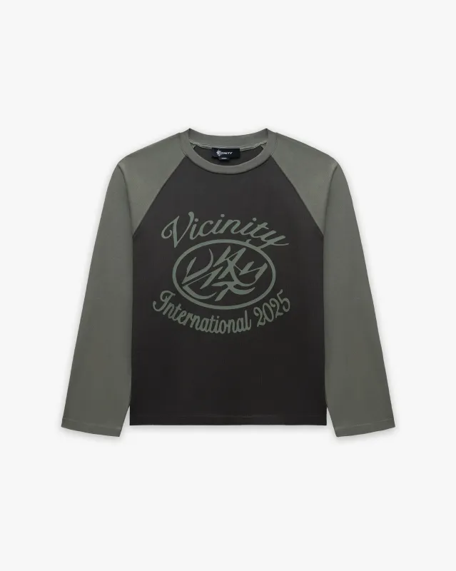INTERNATIONAL LONGSLEEVE GREEN sold by vicinity